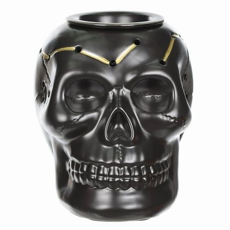 Decorate with thrilling, mischievous style at your next Halloween or goth-themed party with the spooky 5"L x 6.13"W x 5.5"H Black Ceramic Skull Electric Wax Warmer Tabletop Decoration. Stylishly designed in classic black, this exquisitely crafted skull measures 5"L x 6.13"W x 5.5"H and will easily complement most home dcor and other peculiar party props. Recommended for Living Room Just place your favorite scented wax melts inside and plug the skull in for some extra seasonal ambiance. The durable warmer is constructed of ceramic with a glazed finish for years of Halloween and fall seasonal appearances or to be displayed as a year-round decoration, if you dare. The 5"L x 6.13"W x 5.5"H Black Ceramic Skull Electric Wax Warmer Halloween Decoration Way to Celebrate is the perfect party prop f Frozen Wall Decals, Warm Halloween, Black Candlesticks, Flameless Taper Candles, Ceramic Skull, Black Taper Candles, Skull Candle Holder, Paper Fan Decorations, Round Decoration