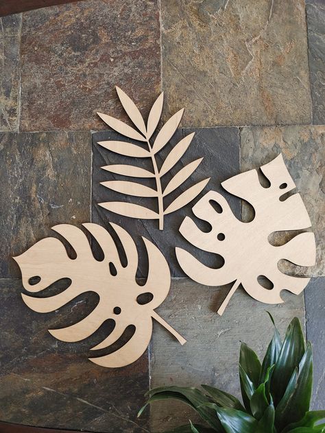 Fun and unique monstera Leaf cutouts - perfect for tropical party decor, kids birthday, baby shower , wedding, housewarming , home decor. Designed and handcrafted with love and care in my studio in Oregon PRODUCT DETAILS : - Wood Monstera Leaf Cutout 10in x 7.5in - Unpainted 1/8in plywood - Light weight . - Sell per piece . HARDWARE: We do not include hardware ! You can use double sided tape ( 1lb) or mini nails If you wish to personalize the product , or have any questions/concerns , please mes Plywood Decor, Mini Nails, Simple Room Decoration, Dance Crafts, Leaf Cutout, Tropical Party Decorations, Laser Cut Wood Crafts, Summer Party Decorations