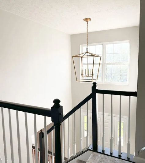 The Perfect Two-Story Foyer Chandelier Height (Complete Size Guide) - Home By Alley Front Hall Chandelier Entryway, Stairwell Chandelier Ideas, Two Story Foyer Chandelier, Two Story Foyer Ideas Entryway, Two Story Chandelier, 2 Story Foyer Lighting, Foyer Chandelier 2 Story, Entryway Chandelier Foyers, Two Story Foyer Lighting