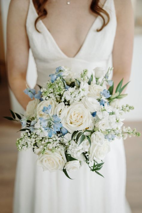 Bluegrass Chic | Classic White & Light Blue Wedding at The Alfond Inn light blue bridal bouquet Dusty Blue Wedding Floral Arrangements, Blue Wedding Theme Bouquet, Light Blue Bride Bouquet, Wedding Flowers With Dusty Blue, White Bridal Bouquet With Blue Accents, French Blue Wedding Bouquet, White And Light Blue Wedding Bouquet, Bride Bouquets Blue And White, Wedding Blue Bouquet