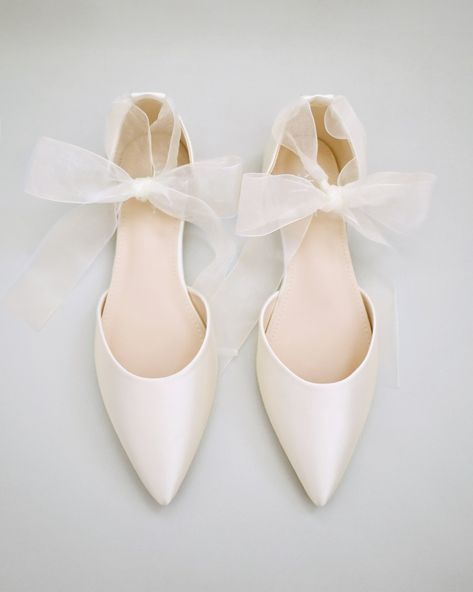 Satin pointy toe flats with satin ankle tie or ballerina lace up. Comfortable wedding shoes throughout ceremony and reception to dance the night away. *** YOU CAN ALSO CHOOSE STYLE OF ANKLE STRAP AT CHECKOUT*** DETAILS: UPPER: Synthetic upper and lining MATERIALS: Manmade outsole HEEL HEIGHT: 0.3" ORIGIN: Imported Wedding Flats With Bow, Wedding Ballerina Flats, Wedding Reception Shoes Dancing, Bridal Flats Shoes, White Flats Wedding, Ballerina Wedding Shoes, Flat Wedding Shoes For Bride, White Wedding Shoes Flats, Ballet Flats Wedding