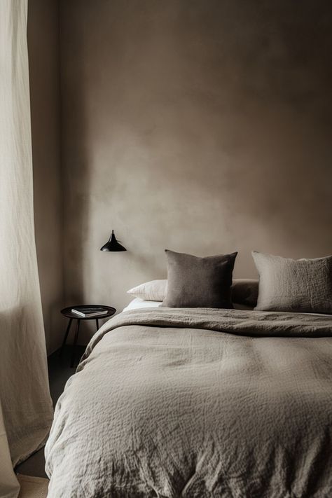 Embrace the serene beauty of minimalism with this stunning bedroom featuring lime washed walls. The soft, natural texture adds depth and warmth, creating a tranquil retreat that's as stylish as it is calming. #MinimalistDesign #LimeWashedWalls #SereneSpaces #BedroomInspiration Taupe Lime Wash, Lime Plaster Bedroom, Beige Limewash Bedroom, Limewash Bedroom Accent Wall, Venetian Plaster Walls Bedroom, Neutral Limewash Walls, Line Wash Walls, Limewash Paint Bedroom, Lime Wash Walls Bedroom