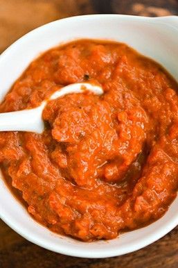 Ajvar (Serbian Roasted Red Pepper Sauce) Recipe | Red peppers and eggplant roasted over a wood fire give this sweet and tangy Serbian sauce a pleasing smokiness.	  #condiments #sides #recipes #flavorbombs #seriouseats #recipes Serbian Ajvar Recipe, Ajvar Recipe Croatian, Cevapcici Recipe, Ajvar Recipe, Roasted Red Pepper Sauce Recipe, Red Pepper Sauce Recipe, Eggplant Roasted, Croation Recipes, Serbian Food