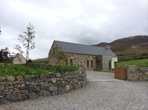 I like the stone wall on the left but would omit the castle look on top. Nice roof and gable meeting point too. Stone Front House, Cottage Courtyard, Stone House Revival, Attic Conversions, Irish Cottages, Country Cottage House Plans, House Designs Ireland, Irish Architecture, Conservatory Ideas