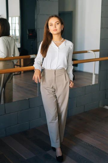 Premium Photo | Vertical portrait of elegance confident young woman wearing stylish clothes looking at camera standing in room with mirror pretty successful female teacher posing in art classroom Female Teacher Outfits, Teacher Pose, Room With Mirror, Fire Costume, Female Teacher, Confident Style, Stylish Clothes, Yellow Sweater, Human Nature