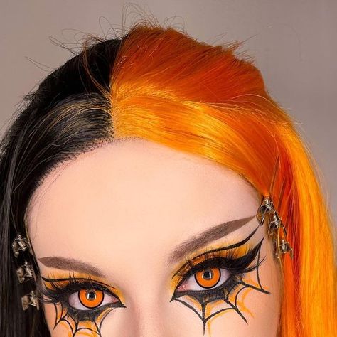 Leah Sapp on Instagram: "Some pics of the spider web look I posted a tutorial on the other day! I always say I wish my real eye color was red but now orange might be a close second fave 😫 . Makeup details- Eyes: @aboutfacebeauty matte fluid eye paints in spectre and art of darkness, liner in into the void @bellabeautebar best mattes palette @kaima_cosmetics loose pigment in buttercup @nyxcosmetics epic ink liner and glitter glue @glisten_cosmetics wet liner in carrot cake @benefitcosmetics gim Spider Liner Makeup, Spider Man Makeup Women Eye, Halloween Inspired Eye Makeup, Orange Halloween Makeup Looks, Red Liner Makeup Looks, Spider Web Liner, Spiderweb Makeup Eye, Cobweb Makeup, Spider Makeup Looks