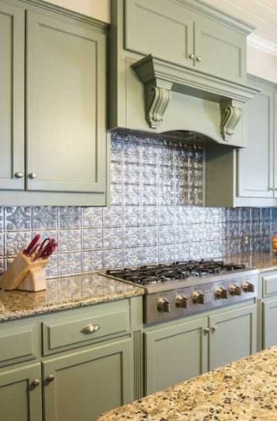 23 Tin Backsplash Design Ideas for Your Kitchen | Sebring Design Build Tin Tile Backsplash Kitchen, Granite Kitchen Backsplash, Kitchen Backsplash On A Budget, Backsplash On A Budget, Kitchen Backsplash Ideas Farmhouse, Tin Tile Backsplash, Farmhouse Kitchen Backsplash Ideas, Metal Backsplash Kitchen, Tin Backsplash Kitchen