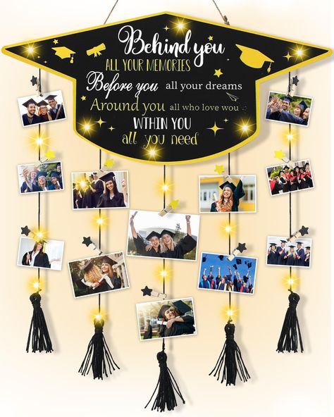 PRICES MAY VARY. Warm graduation picture frame: You will receive a wooden board designed in the shape of a graduation cap with an inspirational message, 5 tassel ropes, 30 clips and a string of lights, clips can hold photos, postcards, money, paintings, etc., to show your wonderful life. Excellent production: The graduation photo hanger is made of high-quality wood, classic retro style, with graduation related elements and art text design, clear printing, reusable, will accompany you for a long Wooden Picture Board, What To Do With Photos Prints, Class Board Ideas, Senior Party Ideas High School, Male Graduation Party Ideas, Money Paintings, Scrapbooking Graduation, Graduation Picture Display, Farewell Party Ideas