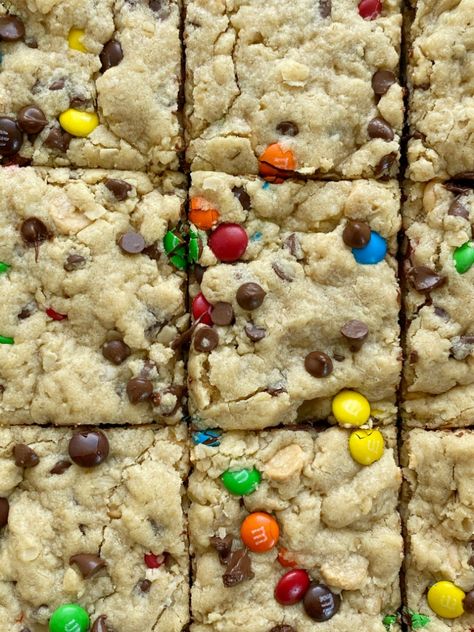 Soft-Baked Monster Cookie Bars - Together as Family Halloween Cookie Bars, Monster Cookie Bars Recipe, Mnm Cookies, Monster Cookie Dough, Oats Chocolate, Monster Cookies Recipe, Monster Cookie Bars, Peanut Butter Oats, Monster Cookie