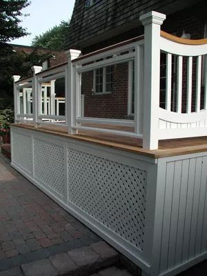 Elements of a Custom Deck: An Example Porch Skirting, Deck Skirt, Porch Lattice, Deck Skirting Ideas, Skirting Ideas, Front Porch Deck, High Deck, Deck Skirting, Deck Railing Design