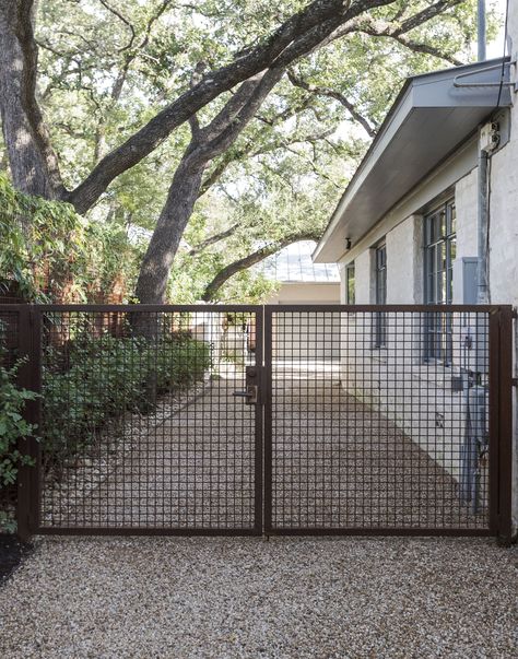 There is something sinister about a landscape of rusted metal: a corroded car off the highway, a forgotten Midwestern town, or a decaying seaport. The visc Metal Driveway Gates, Fasad Design, Pergola Design, Desain Lanskap, Front Yard Fence, Pool Fence, Front Gates, Lan Can, Fence Landscaping