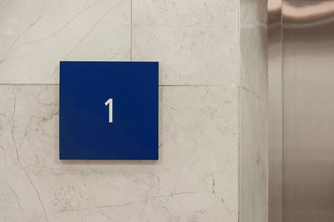 Floor Number Signage, Industrial Warehouse Exterior, Lippo Plaza, Factory Interior Design, Blue Signage, Warehouse Exterior Design, Warehouse Exterior, Number Signage, Signage Wayfinding