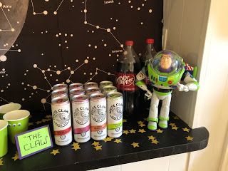 Toy Story Party Crafts, Toy Story Inspired Drinks, Buzz Lightyear Dessert, Buzz Lightyear Themed Birthday Party, Buzz Light Year Party Favors, Reach 4 The Sky Toy Story Party, Toy Story Alcohol Drinks, Toy Story Birthday Party Ideas Food Dessert Tables Buzz Lightyear, Buzz Lightyear Themed Food