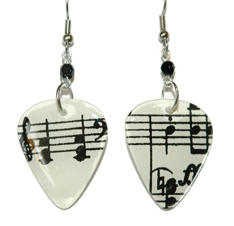 PRICES MAY VARY. Made of epoxy over artwork (not real guitar picks) Measures 2" long (including the ear wires) x 1" wide Has surgical steel ear wires This fun pair of earrings made of epoxy over artwork. They are NOT real guitar picks. The earrings measure 2" long (including the ear wires) x 1" wide and have surgical steel ear wires. Guitar Picks Diy, Wire Guitar, Notes Guitar, Guitar Pick Jewelry, Guitar Bag, Crystal Perfume Bottles, Earrings For Sale, Music Jewelry, Earrings Hoop