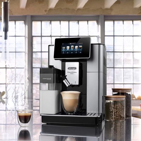 With up to 21 customisable recipes and a digital display which automatically ranks your beverages according to usage, the DeLonghi PrimaDonna Soul is one clever coffee machine. It also features an integrated cleaning function which cleans all parts that come into contact with milk after every beverage. The Bean Adapt Technology sets the specific grinding size and brewing parameters for tailormade extraction based on the beans you've chosen. Clever Coffee, Iced Coffee Maker, Mocha Recipe, Mocha Coffee, Automatic Coffee Machine, Chocolate Powder, Milk Foam, Frothing Milk, Chocolate Sprinkles