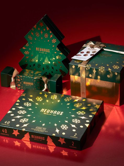 WeWantMore - Neuhaus Holidays 2019 - World Brand Design Society  /  The holidays are literally the darkest time of the year, outside at least. Inside people decorate their trees with Christmas lights, sit around the fireplace and use candles to light up their homes and hearts. Christmas Candle Packaging Design, Xmas Packaging Design, Holiday Package Design, Christmas Packaging Design Inspiration, Christmas Box Design Packaging, Christmas Package Design, Christmas Box Packaging, Christmas Box Design, Packaging Design Christmas