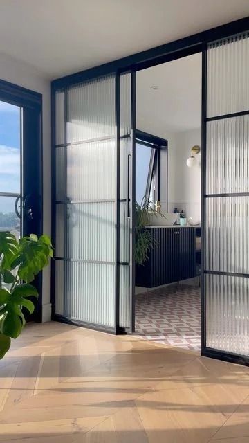 Partition Glass Wall: Designs, Price, Benefits and More Fluted Glass Partition Sliding Doors, Glass Wall Bathroom Bedroom, Profile Partition, Glass Wall Partition Design, Glass Separation Wall, Sliding Glass Door Bedroom, Ribbed Glass Door, Bathroom Glass Partition, Reeded Glass Wall