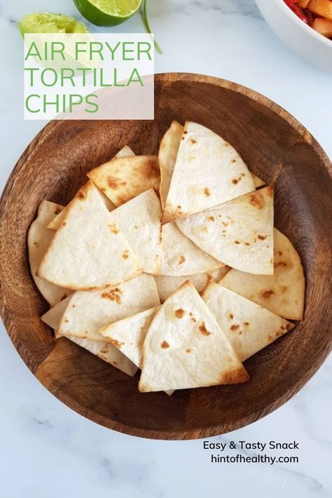 These easy air fryer tortilla chips can be made with flour tortillas or corn tortillas with a drizzle of vegetable oil. A quick and easy snack or appetizer. They are crispy and crunchy, and perfect to serve with your favorite dip. You can add any seasoning you like to make them sweet, spicy and more! An excellent kid friendly snack that's simple and healthy, great as an after school treat. Homemade Chips With Flour Tortillas, Flour Tortillas Chips, Air Fried Flour Tortilla Chips, Flour Tortillas In Air Fryer, How To Make Chips From Flour Tortillas, How To Make Tortilla Chips In Air Fryer, Air Fryer Flour Tortilla Recipes, Air Fryer Flour Tortilla Chips, Make Tortilla Chips Out Of Tortillas