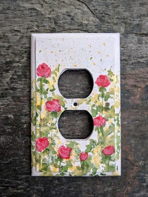 Outlet Painting Ideas, Outlet Covers Painting, Painting Outlets, Painted Outlets, Light Switch Art, Light Switch Covers Diy, Pink Floral Wall, Wall Outlet, Light Switches