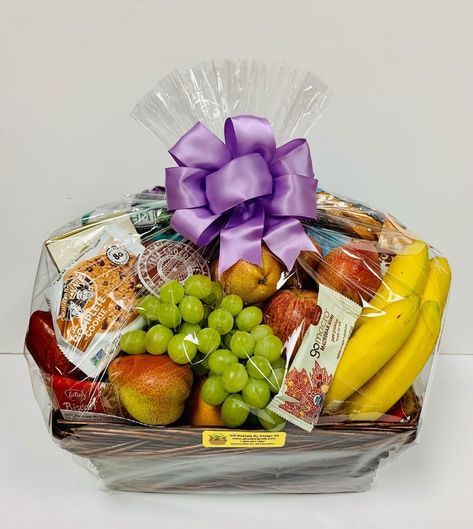 A large basket overflowing with fresh fruit and a full assortment of 🌱 vegan/ Gluten Free or both products your choice a perfect way to celebrate anyone on your gift list that has food sensitivities requirements. All wrapped up with a beautiful hand made bow and a hand written card with your message. This gift is perfect for any occasion. **Vegan Design and Gluten Free Design shown in pictures **Basket Style May Very NOTICE::No Shipping hand delivered locally only Fruit Gift Box Ideas, Fruit Business Ideas, Fruit Gift Basket Ideas, Gift Fruit Basket, Fruit Basket Ideas Gift, Fruit Business, Vegan Gift Basket, Church Friends, Fruit Hampers