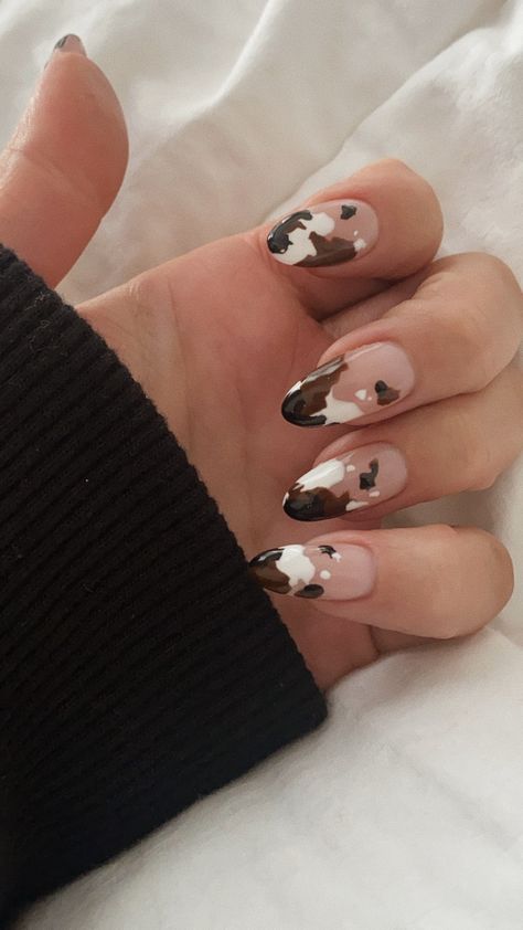 Cow Oval Nails, Cow Themed Nail Art, Glitter Nails With Nail Art, Nail Cow Designs, Cow Print Nails Matte, Cow Print Nails How To, Tan Cow Print Nails, Cow Hide Nail Designs, How To Cow Print Nails