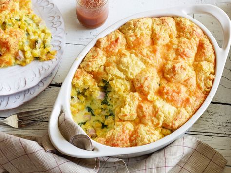 Recipe of the Day: Cheesy Breakfast Cornbread Casserole         Sidestep the bacon-and-eggs breakfast in favor of a hearty bake that doubles down on corn. It starts with a creamed corn base that's loaded with ham and kale, and it ends with a cheddar-packed cornbread topping that puffs and spreads as it bakes. Cornbread Breakfast Casserole, Breakfast Cornbread, Cornbread Breakfast, Casserole With Ham, Best Breakfast Casserole, Cornbread Casserole, Breakfast Casseroles, Best Christmas Recipes, Kale Recipes