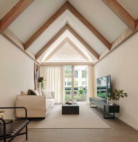 House Tour: Lofty pitched ceilings and distinct zones make this condo apartment feel like a landed property - Home & Decor Singapore Gabled Ceiling, Granite Steps, Timber Sliding Doors, Pitched Ceiling, Design Anthology, Hidden Lighting, Timber Panelling, House Apartment, Residential Interior Design