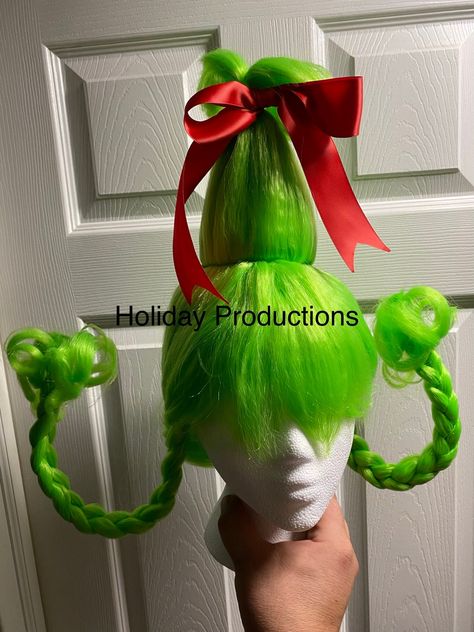 USA Shipping Only! Cindy Style Grinch Girl Costume Wig Adult New. Beautiful deluxe costume wig. Wired pigtails for posing. Red ribbon included for tying the perfect bow. Wig has attached elastic straps for perfect fitting. Any questions please ask! Be sure to also check out our full GROUCH MASCOT listed in a different listing! Go to this year's Christmas Party Or Parade dressed as this iconic character and steal the show! All Sales are final. Item will be shipped in 2-3 business days from NJ. For Sanitary Purposes, Especially under the times we are living in now...ALL WIG SALES ARE FINAL! Please request further information before purchasing should you have any questions! There will be NO Exceptions. Who Ville Decorations Christmas Ideas, Grinch Dress, Whoville Costumes, Christmas Whoville, Whoville Christmas Decorations, Whoville Hair, Grinch Costumes, Christmas Contests, Grinch Christmas Party