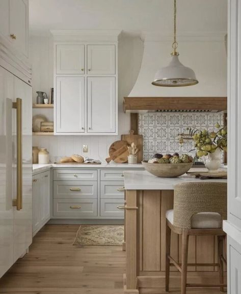 Two toned kitchen cabinets are a gorgeous design trend and we're sharing 17 of our favorite kitchens for inspiration! Mixed Tone Kitchen Cabinets, Modern Farmhouse Kitchens Two Tone Cabinets, Two Tone Kitchen Cabinets Natural Wood And White, Two Toned Cabinets Kitchen, Two Toned Kitchen Cabinets Farmhouse Paint, Dual Tone Kitchen Cabinets Wood, Dual Tone Kitchen Cabinets, 2 Tone Kitchen Cabinets, Two Color Kitchen Cabinets