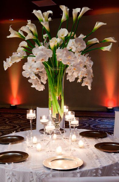 La Torretta Weddings Wedding Flowers Photos on WeddingWire Spring Wedding Centerpieces, Lily Centerpieces, Wedding Party Flowers, White Centerpiece, Reception Centerpieces, Tall Centerpieces, Wedding Table Flowers, Wedding Table Centerpieces, Table Flowers