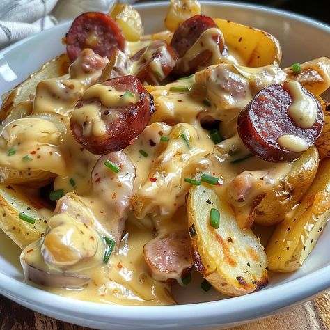 Take Along Dinner Ideas, Recipe Smoked Sausage, Cheesy Potato Sausage Crockpot, Baked Potatoes And Sausage, Cheese Ranch Potatoes And Sausage, Cheesy Sausage And Potatoes Skillet, Sausage Main Dishes, Cheesy Potatoes And Kielbasa, Sausages And Potatoes