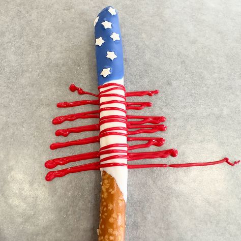 Stars and Stripes Flag Pretzels Red White And Blue Pretzel Rods, 4th Of July Chocolate Covered Pretzels, Flag Rice Krispie Treats, Blue Pretzel Rods, Cookie Monster Pretzel Rods, Decorated Pretzels, Pie Pockets, Dipped Pretzel Rods, Cherry Hand Pies