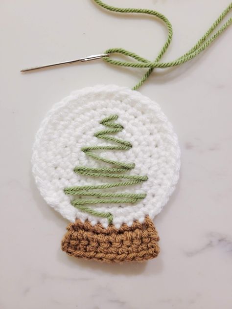 Crochet Christmas Tree Snow Globe | Heather Corinne Crochet Snowglobe Ornament, Crochet Christmas Snow Globes, Crochet Snow Globe Ornament, Snow Globe Crochet, Free Crochet Holiday Patterns, Cute Crochet Ideas Christmas, Free Crochet Christmas Tree Ornaments, Crochet Christmas Tree Decorations Free, Easy Christmas Crochet Ornaments