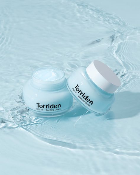 Achieve unparalleled hydration with the award-winning DIVE-IN Low Molecular Hyaluronic Acid Soothing Cream by Torriden. This innovative gel cream delivers fresh, soothing moisture through its advanced 5D multi-low-molecular hyaluronic acid system.Formulated with five types of hyaluronic acid, this cream ensures enhanced absorption, deeply replenishing hydration from within. The unique blend of high, medium, and low-molecular weight hyaluronic acids work to fully saturate your skin with moisture, Water Ball, Skin Care Products Design, Skincare Products Photography, Cosmetics Photography, Hydrating Toner, Below The Surface, Safe Cleaning Products, Facial Mist, Cleansing Balm