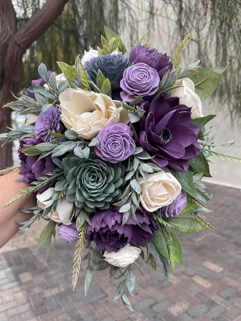 Katie 3/25/23 - Wood Flower Custom Wedding Quote in Shades of Purple, Sage Colors, Succulent center, White Anemones and Plum Purple Peonies, Dusty Miller Greenery, (1) Bride 11x14" Cascade Bouquet $329 (1) Groom Boutonniere $FREE (6) Matching 10" Bridesmaids $1,170.00 ($199 ea/discounted to $195 ea.) (6) Matching Boutonnieres $192 (33.99-38.99 ea/discounted to $32 ea.) (1) Consultation/Quote prep $ FREE TOTAL PACKAGE PRICE ~ $1,691.00 *FREE Standard Shipping (Unless Specialty or Expedited) *Your Plum And Hunter Green Wedding, Sage And Purple Wedding Decor, Purple And Green Spring Wedding, Sage Green And Purple Wedding, Purple Dahlia Bouquet, Violet Wedding Theme, Green And Purple Wedding Theme, Purple And Green Wedding Cake, Lavender Color Flowers