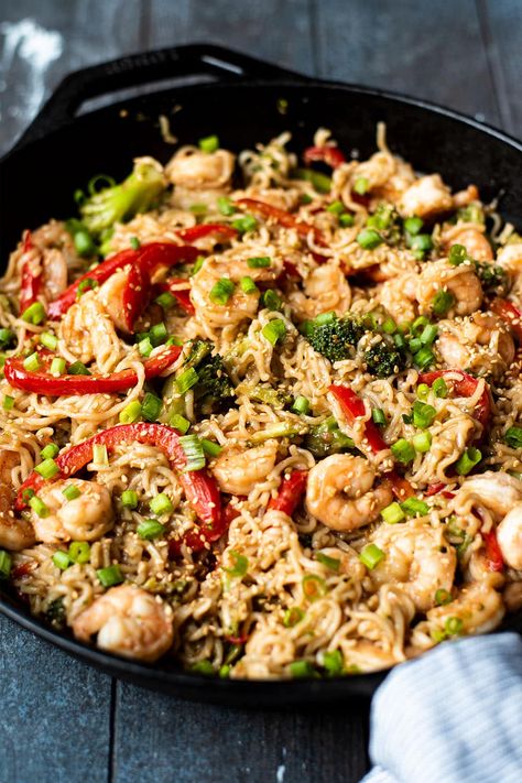 Shrimp stir fry with ramen noodles is a mashup of shrimp lo mein beef and broccoli. Made with shrimp, broccoli florets, red bell pepper, fresh ginger, and a sweet and savory sauce, you'll be amazed by how much flavor is packed into a relatively simple weeknight recipe. #shrimpstirfry #asianrecipes #stirfry #ramen #shrimplomein #lomein Lo Mein Beef, Stir Fry With Ramen Noodles, Kitchen Swagger, Shrimp Lo Mein, Stir Fry Shrimp Recipes, Asian Seafood, Shrimp Broccoli, Wok Recipes, Shrimp Stir Fry