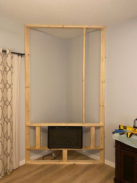 Corner Fireplace Build, Corner Wall Fireplace Ideas, Framing Corner Fireplace, Build Corner Fireplace, Corner Diy Fireplace, Corner Fireplace Ideas Diy, Diy Corner Fireplace How To Build, Corner Fireplace Tv Wall, Faux Corner Fireplace