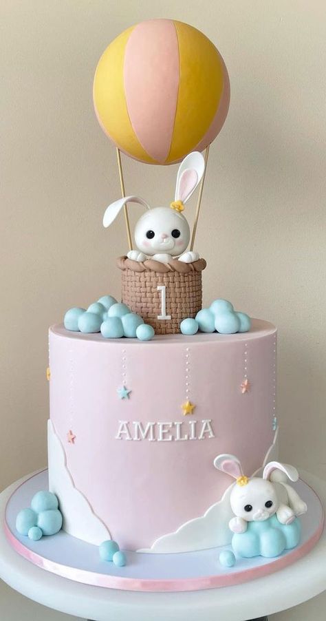 13. Cute bunny in hot air balloon cake Children’s parties are easy and fun to plan. All you have to do is to decide... Hot Balloon Cake, Balloon Cake Ideas, Baby Girl 1st Birthday Cake Ideas, Bunny Cakes Birthday Kids, Fondant Hot Air Balloon, 1st Birthday Cake Design, 1 St Birthday Cake, Hot Air Balloon Birthday Cake, Cake With Bunny