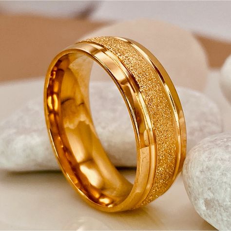 This Wedding Band Is Perfect For Those Who Want A Bold Piece That Reflects Their Personality And Is Equally Stylish And Durable. The Minimalist Design With Ice Matte Brushed Finish Create A Sleek And Refined Look That Pairs Easily With Any Outfit. Comfort Fit Ensures A Secure, Comfortable Wear That Won't Hold You Back. As It’s Crafted From Durable Materials, This Band Is Built To Be With You For A Lifetime, Witnessing Your Joys And Milestones. Features: - Titanium Steel 18k Gold Pvd Coated -Comf Best Wedding Ring Men, Groom Gold Rings, Cheap Gold Wedding Ring, Marriage Ring Band, Marriage Gold Rings Couple Unique, Wedding Rings His Gold, Wedding Gold Ring Men, Best Wedding Rings For Him, Couples Gold Wedding Rings