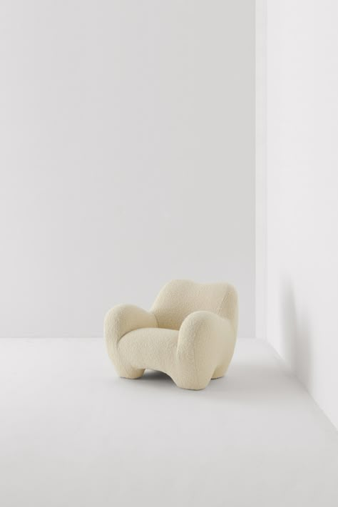 The Gummy Chair is a fully upholstered chair with generous, anthropomorphic proportions. Made using traditional upholstery techniques and all natural materials. Gummy is offered in a range of fabrics including Pierre Frey’s chunky wool bouclé “Opio” in nine colours include Natural, a light cream and Prussiana, a deep blue green. Made to order.Colour: NaturelMaterial: Ply, Springs, Hessian, Cocolok, Wool CoverTextile: OpioDimensions: 83(h) x 106(w) x 106(d) cmWeight: 25kg Additional info +Downlo Neutral Color Furniture, Lounge Armchair Design, Upholstery Techniques, Traditional Upholstery, Pierre Frey Fabric, London Design Festival, Pine Furniture, Sofa Bench, Upholstered Chair