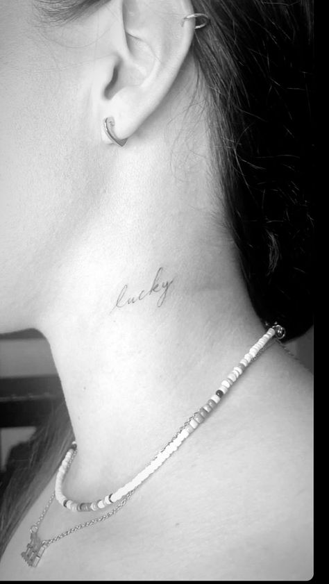 Lucky tattoo, fine line Lover Fine Line Tattoo, Lucky In Cursive Tattoo, Lucky Small Tattoo, Lucky Font Tattoo, One Word Fine Line Tattoo, Lucky Neck Tattoo, Lucky Name Tattoo, Lucky Cursive Tattoo, Fine Line Back Of Neck Tattoo