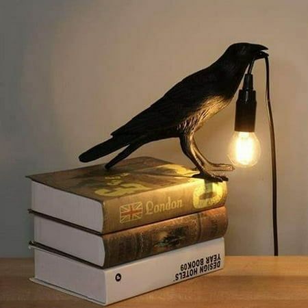 This is a sturdy and beautiful raven desk lamp. Assembly is super easy. It just happens to have a slightly open beak that just grabs onto the cord of a black lamp base. You can always remove the rope from the crow's beak and let the bulb hang higher or lower depending on your preference. Specification: Light Source Type: E12 LED Voltage: 110-220 V Material: Plastic Size: 11.6 x 4.7 x 7 inchs Style: Modern Room Type: Bedroom, Living Room, Baby Room, Home Office Package Included: 1 x Raven Table L Black Lamp Base, Led Bedroom, Bedside Wall Lights, Table Lights, Bedroom Table, Wooden Table Lamps, Light Bedroom, Modern Art Decor, Table Lamps For Bedroom