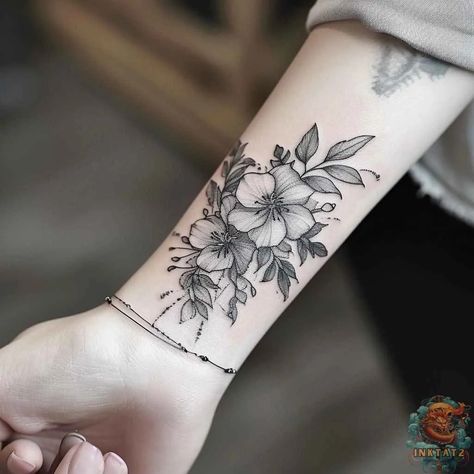 170+ Women's Feminine Forearm Tattoos Designs (2024) - TattoosBoyGirl Female Flower Forearm Tattoo Ideas, Forearm Family Tattoo For Women, Forearm Vine Tattoo Women, Big Wrist Tattoos For Women, Girl Forearm Tattoos, Flower Tattoos Wrist, Flower Wrist Tattoos For Women, Inner Arm Tattoos For Women Forearm, Side Of Forearm Tattoo Women