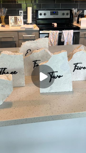 Diy Stone Table Numbers, Stone Wedding Table Numbers, Rock Table Numbers, Olivia Armstrong, Stone Table Numbers, Granite Table, Slab Table, Wedding Table Plan, Table Plan