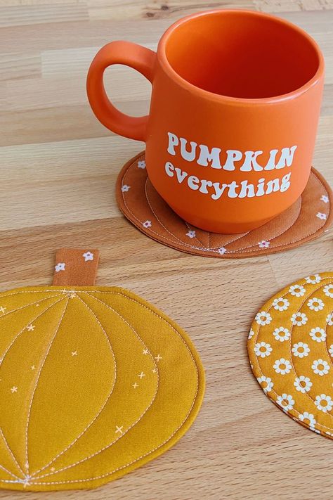 Easy DIY Pumpkin Coasters Make Your Own Fall Decor Fall Coasters Sewing, Thanksgiving Sewing Projects Easy Diy, Thanksgiving Coasters Diy, Fall Mug Rugs Patterns Free, Fall Coasters Diy, Halloween Coasters Diy, Fall Coasters, Fall Candles Diy, Pumpkin Coasters