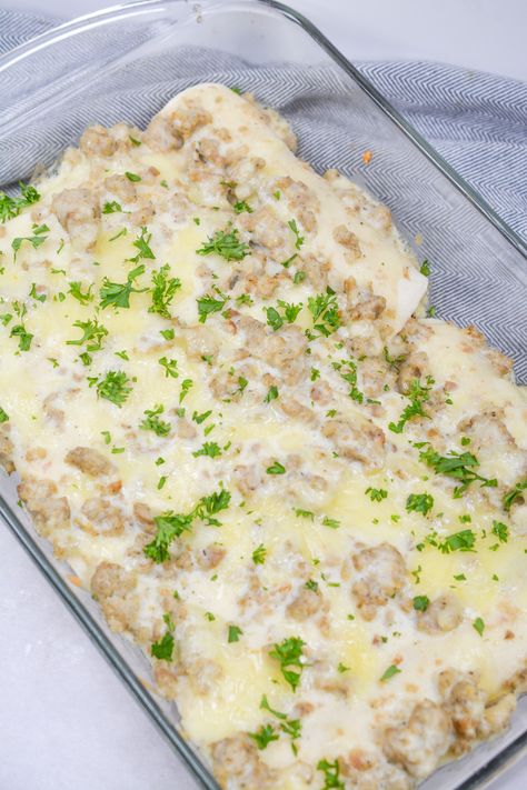 Start the day off right with our Sausage Gravy Breakfast Enchiladas - a delicious twist on the classic breakfast dish! Country Gravy Breakfast Enchiladas, Breakfast Enchiladas With Sausage Gravy, Leftover Sausage Gravy, Sausage Gravy Breakfast, Gravy Breakfast, Breakfast Lasagna, Omlet Recipes, Leftover Breakfast, Sausage Lasagna