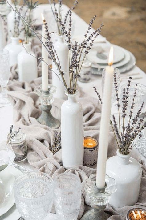 Table setting with lavender flowers in white vases Lavender Wedding Centerpieces, Winter Reception, Winter Table Centerpieces, Lavender Centerpieces, Winter Wedding Decorations, Wedding Reception Centerpieces, Reception Centerpieces, Winter Wedding Inspiration, Wedding Winter