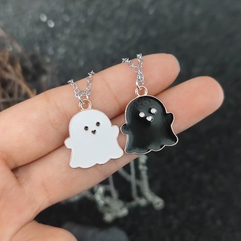 "Ghost Necklace - Black And White Ghost - Couple Necklace - Cute Ghost Necklace - Gift for Him/Her/Best Friends/Couple 🔎Details -Dimensions:  Pendant: Length 0.85\"(21.58mm),  Thick 0.045\"(1.14mm). Chain: Maximum length is up to 17.32\"(44cm) adjustable rope  Dimensions are measured by hand, please allow a slight error -Material: Steel, Silver Add a touch of cuteness and mystery to your love story with our proudly presented Ghost Couple Lucky Necklace. This unique and distinctive couple accessory brings a dual dose of luck and blessings to you and your partner. Inspired by the enigmatic realms of fairy tales, the ghost pendants are available in both black and white styles, creating the perfect match for you and your significant other. Double Blessings of Luck: The Ghost Couple Lucky Neck Chain For Best Friend, Matching Necklaces For Best Friends, Ghost Couple, Couples Necklaces, Jewelry For Couples, Couple Accessories, Ghost Necklace, Friends Couple, Lucky Necklace