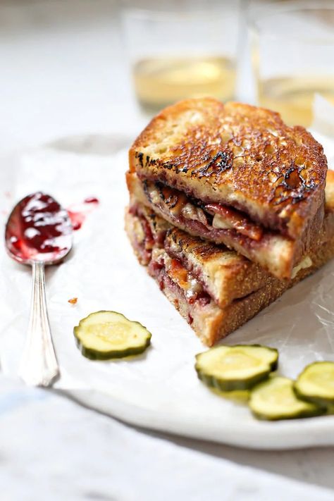 Make a delicious Brie Grilled Cheese by layering creamy brie, bacon, and raspberry jam between buttery, crispy bread for an easy Grilled Cheese with Brie. You'll love the combination of sweet and salty, crispy and gooey in this grilled cheese sandwich recipe. Cheese With Jam, Grilled Cheese Brie, Bacon And Brie, Bacon Sandwich Recipes, Brie Grilled Cheese, Cheese Brie, Creamy Brie, Brie Sandwich, Grilled Cheese Sandwich Recipe