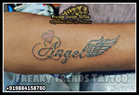 Angel Tattoo Angel name tattoo Name Tattoo Freaky Trends Tattoo Wings and name Tattoo 9884158760 Angel Wings Name Tattoo, Name Rip Tattoo, Name And Angel Wings Tattoo, Angel Tattoo For Women Word, The Name Angel Tattoo, Angelica Name Tattoo, Word Angel Tattoo, Angel Tattoo Writing, Angel Name Tattoo